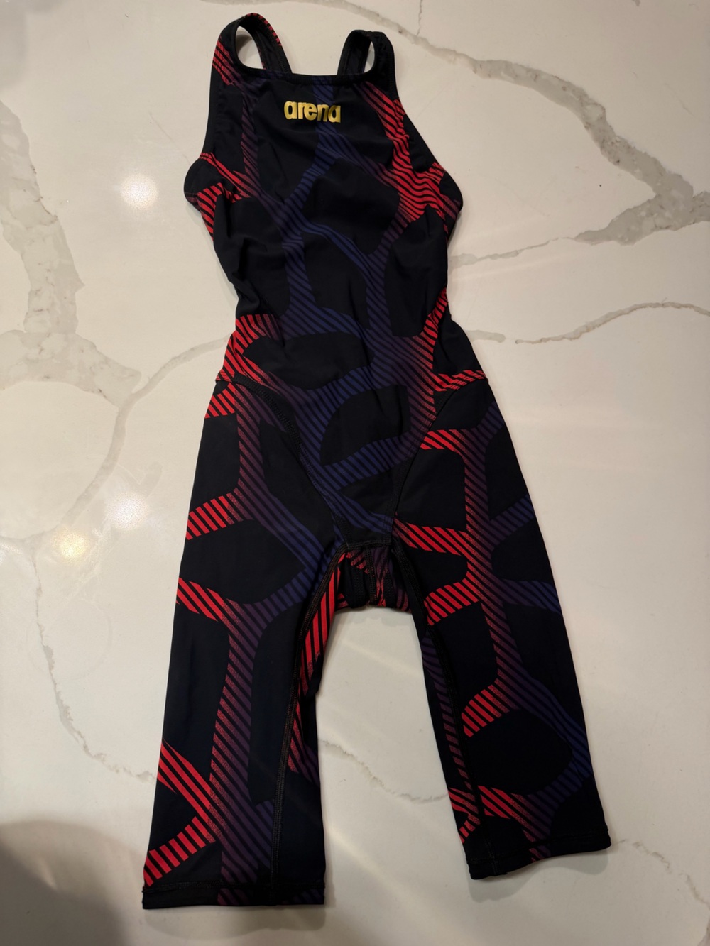 Arena Powerskin ST- Red, blue, and Black, Size 26 J